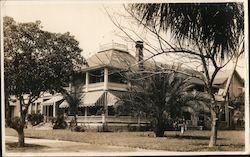 Two Story Grand house, wrap around porches, palm tree Postcard