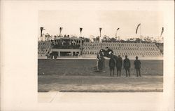 Horse and rider jumping over hurdle Postcard