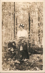 Woman Posing on a Log in Forest Postcard