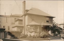 Large two story house, palm trees Postcard