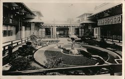 Japanese courtyard garden with fountain Postcard