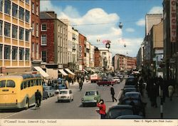 Looking Along O'Connell Street Postcard