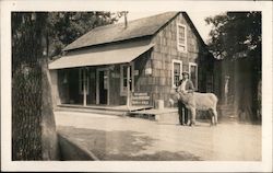 W.O. West's Cash Grocery, Gas and Oils Postcard