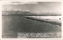 Salton Sea 250 ft. below sea level from Date Palm Beach Calif., San Jacinto and San Gorgonio in distance Postcard