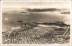 Aerial View with S.F.-Oakland Bay Bridge, Treasure Island Postcard