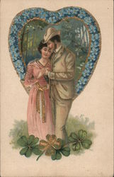 Couple with heart and four-leaf clovers Postcard