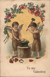 To My Valentine. Cupid blacksmiths forging wedding rings. Postcard