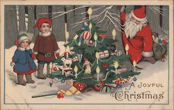 A Joyful Christmas - Santa and Children With Christmas Tree in the Snow Postcard