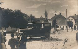 People Along a Cobblestone Street - Church of the Exaltation of the Holy Cross Postcard