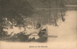 Woman taking Siesta on the Charles River Women Postcard Postcard Postcard