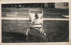 Baby Smiling in Stroller Postcard