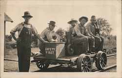 Men with Rail Pump Car "Safety First" Postcard