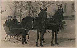 Riding in a two-horse sleigh Postcard