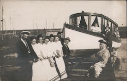 Group Pulling Lydie Boat out of Water Postcard