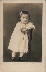 Girl Toddler Posing on Chair Postcard