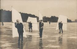 Men Skate Sailing on a Lake Postcard