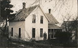 Man in Front of Home Postcard