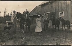 Man and Woman with Horses Outside Barn Postcard