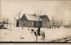 Person on Horse in Front of Snow Covered House Buildings Postcard Postcard Postcard