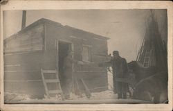 Frontier Shack, Man with Violin Case Postcard