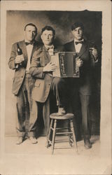 Three Men in Bow Ties Holding a Wine Bottle, an Accordion, and a Glass Respectively Performers & Groups Postcard Postcard Postcard