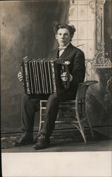 Guy with Wild Hair and Bow Tie Playing Accordion Postcard