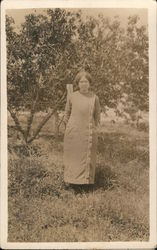 Woman in Orchard Postcard