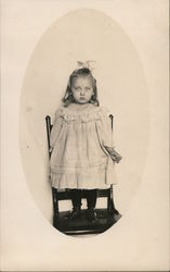 Little Girl Standing on a Chair - Sad Face Postcard