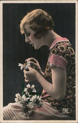 Woman from Side Picking Petals, He Loves Me He Loves Me Not Postcard