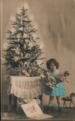 Christmas Tree Child with Dolls Postcard