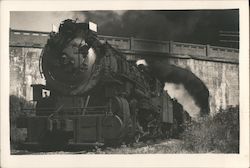 Locomotive Approaching Under Bridge Postcard