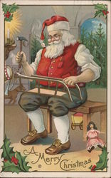 A Merry Christmas Santa Building a Sled Santa Claus Postcard Postcard Postcard