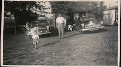 Man and Boy with Cars at Hilltop Cabins Original Photograph