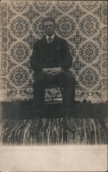 Snapshot of Man in Chair Postcard