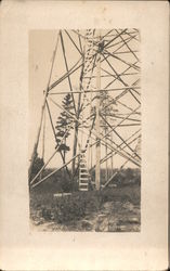 Climbing Ladder of Tall Metal Tower Postcard