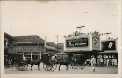 A Row of Horse Drawn Carriages on the Street Postcard