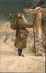 Christmas - Brown Santa in snow landscape at guidepost Santa Claus Postcard Postcard Postcard