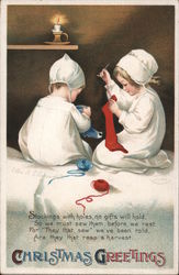 Christmas Greetings - children darning socks Ellen Clapsaddle Postcard Postcard Postcard