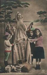 Children Posing With Man Dressed as Santa Postcard