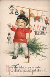 A Merry Christmas - child with toys and some tree branches Postcard