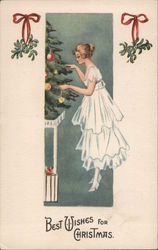 Woman Decorating Christmas Tree Postcard