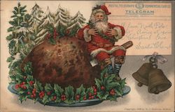 Postal Telegraph - Commercial Cables - Telegram - Santa sitting on knife inserted into plum pudding Santa Claus Postcard Postcar Postcard