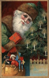 A Merry Christmas - Santa with toys next to Christmas tree Santa Claus Postcard Postcard Postcard