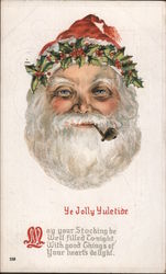 Ye Jolly Yuletide - Santa smoking a pipe with garland of holly on hat Santa Claus Postcard Postcard Postcard