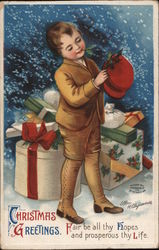 Christmas Greetings - a Boy with Presents and a Hat Children Ellen Clapsaddle Postcard Postcard Postcard