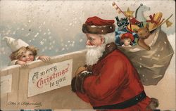 A Merry Christmas to You: Santa carries a bag of toys as a child looks over a wall Postcard