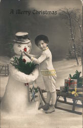 A Merry Christmas - Boy Placing Nose on Snowman Snowmen Postcard Postcard Postcard