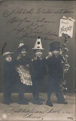 Prosit - Neujahr [Cheers New Year] - 4 children in celebratory costumes Postcard