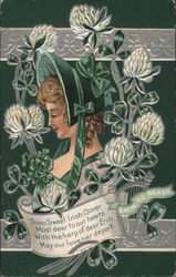 Beautiful lady wearing green, with shamrocks and flowers all around Postcard