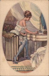 Lady at a dressing table in her bedroom, looking at playing cards Postcard